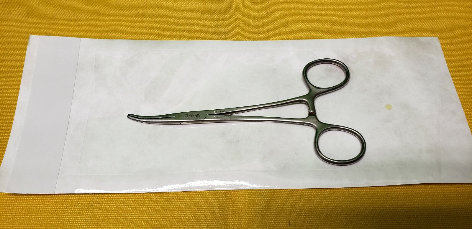 Codman Surgical 334-4160 Dandy Hemostatic Forceps 5.5" Curved Side Ways.