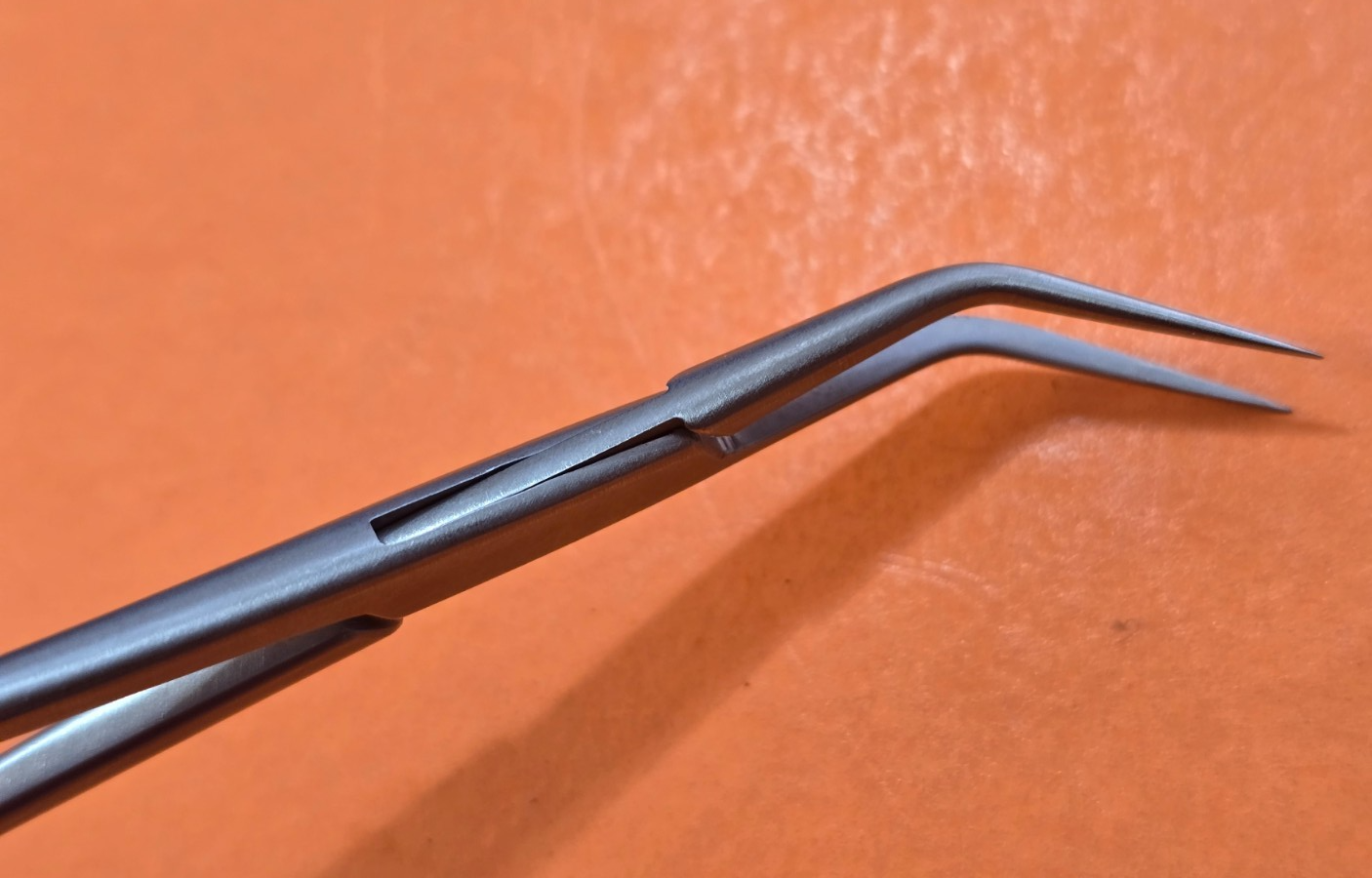 XOMED Surgical McCabe facial Forceps Angled 14mm smooth Jaws 5.5"