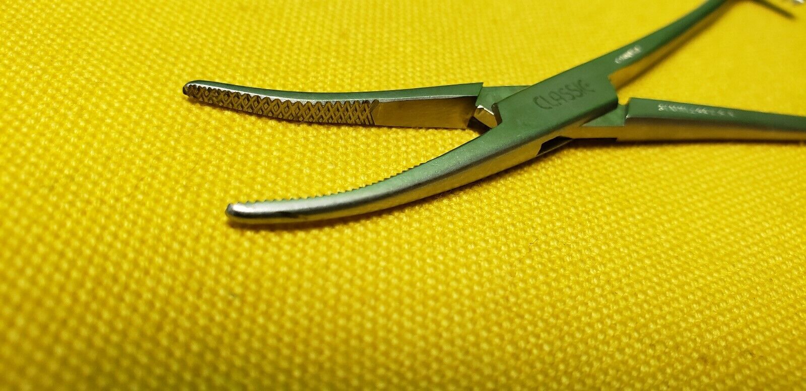 Codman Surgical 334-4160 Dandy Hemostatic Forceps 5.5" Curved Side Ways.