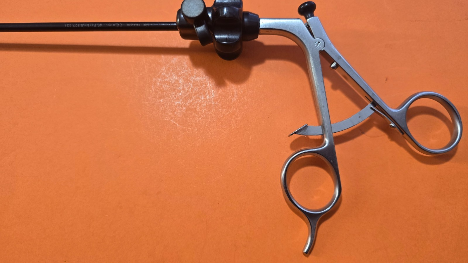 Stryker  250-080-234 Kelly Grasping Forceps 5mm x 33cm Angled Jaws