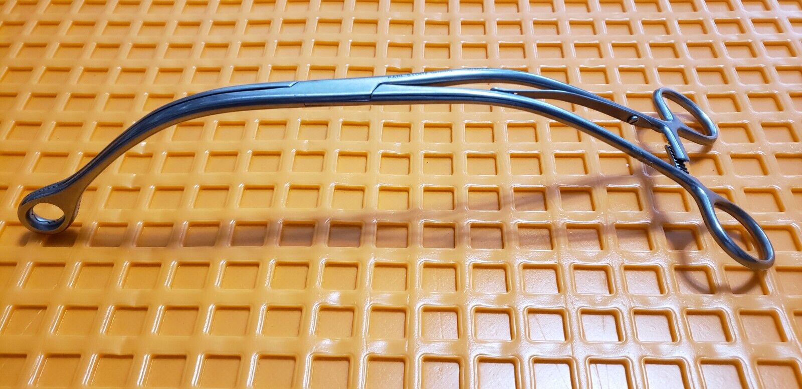 Storz 40400K Surgical Sponge Forceps 10" Curved Jaw & Shanks