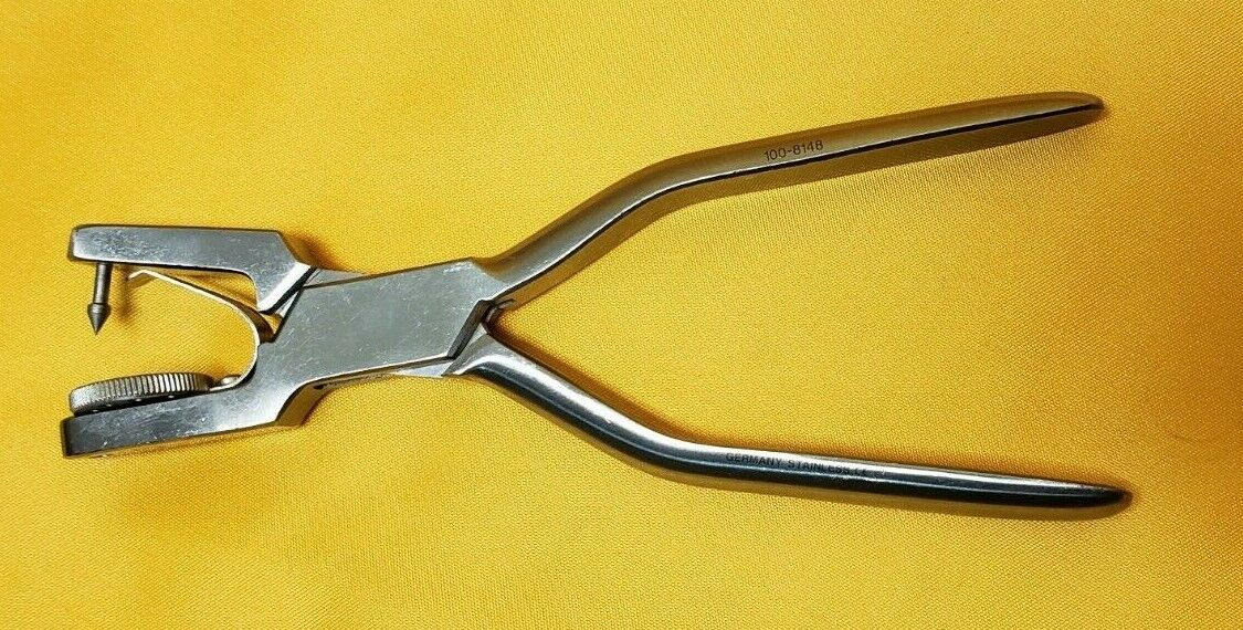 Henry Schein 100-8148 Surgical Dental Rubber Dam Hole Punch Plier.