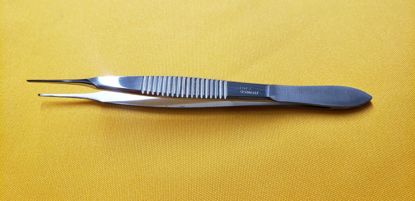 Storz E1654 Surgical Ophthalmic Lester Fixation tissue Forceps 1x2 teeth