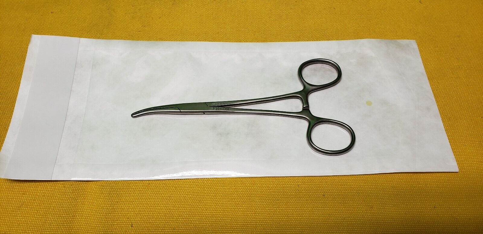 Codman Surgical 334-4160 Dandy Hemostatic Forceps 5.5" Curved Side Ways.