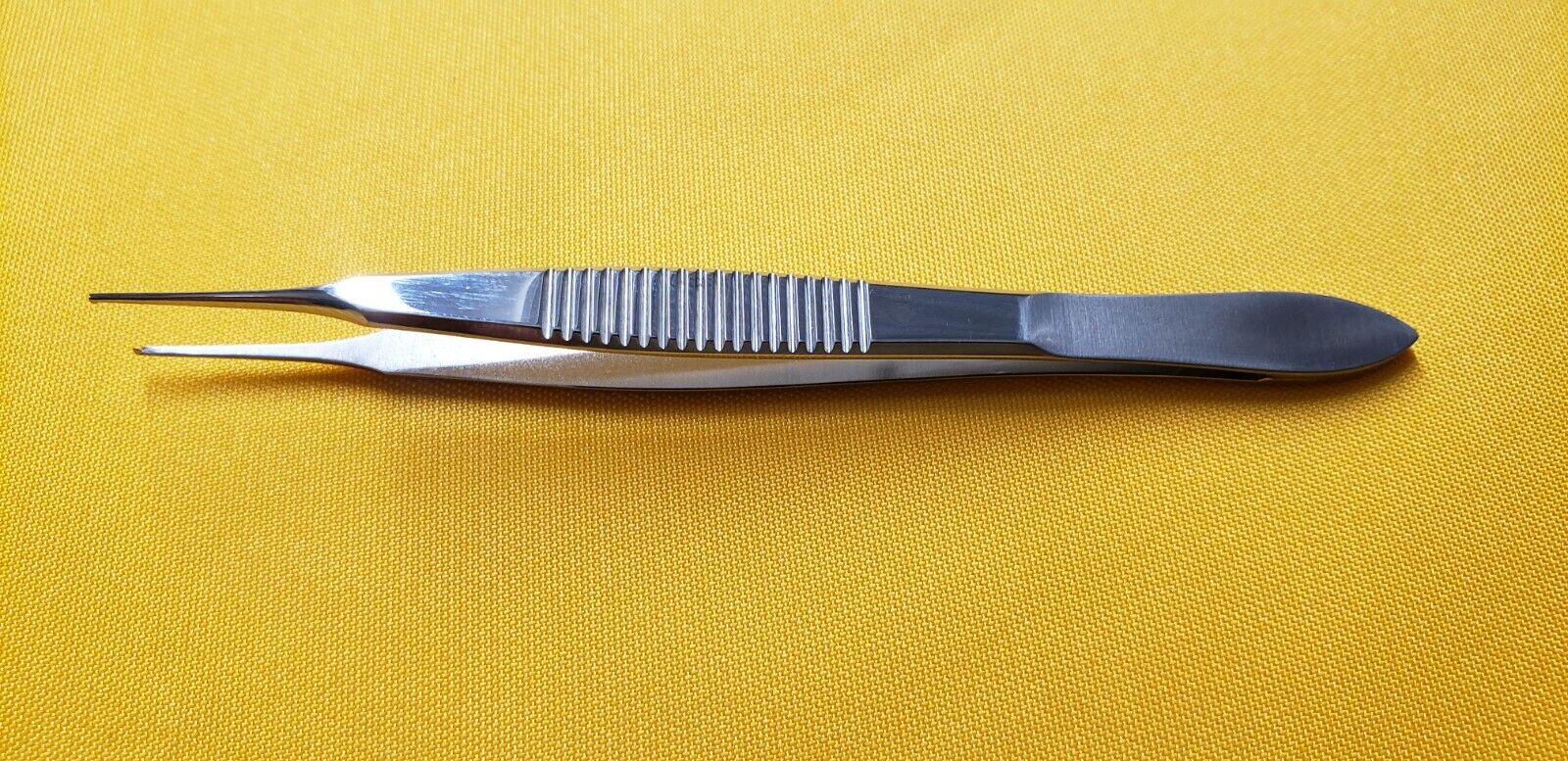 Storz E1654 Surgical Ophthalmic Lester Fixation tissue Forceps 1x2 teeth