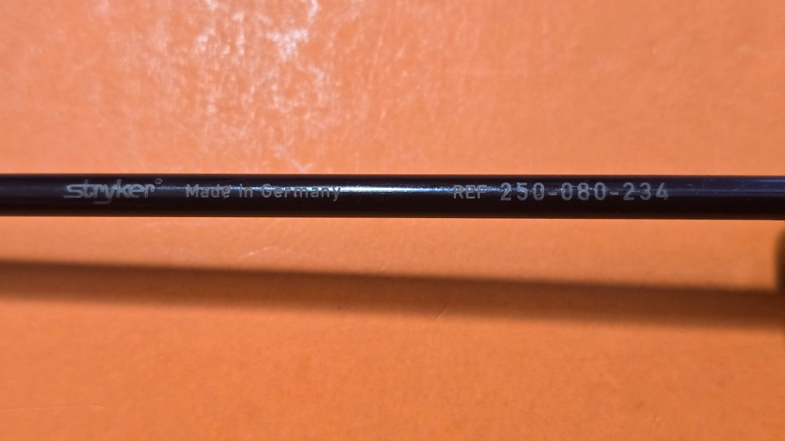 Stryker  250-080-234 Kelly Grasping Forceps 5mm x 33cm Angled Jaws