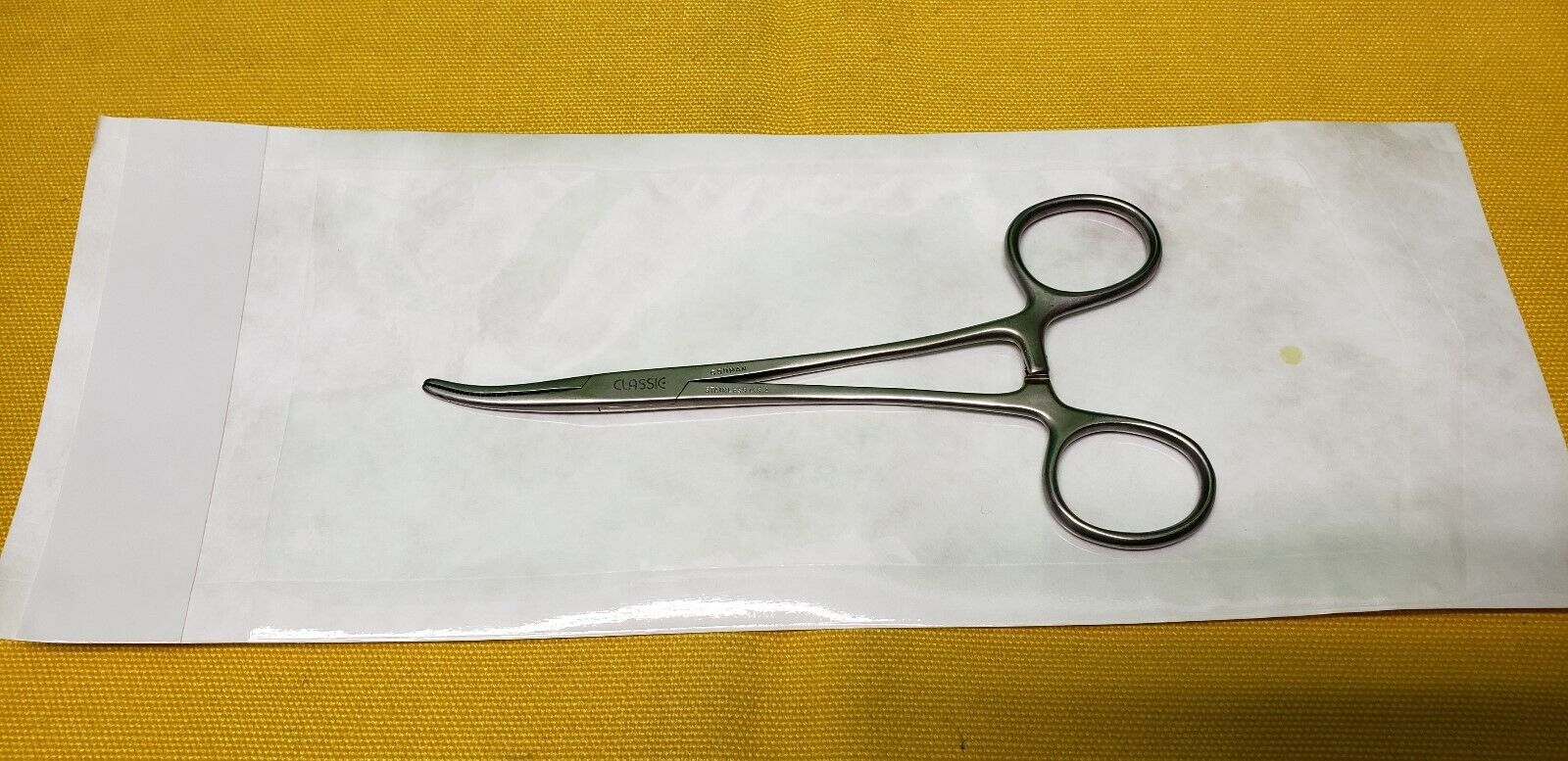 Codman Surgical 334-4160 Dandy Hemostatic Forceps 5.5" Curved Side Ways.