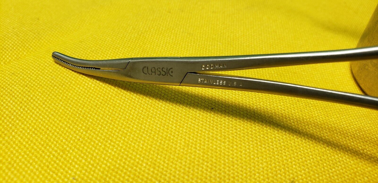 Codman Surgical 334-4160 Dandy Hemostatic Forceps 5.5" Curved Side Ways.