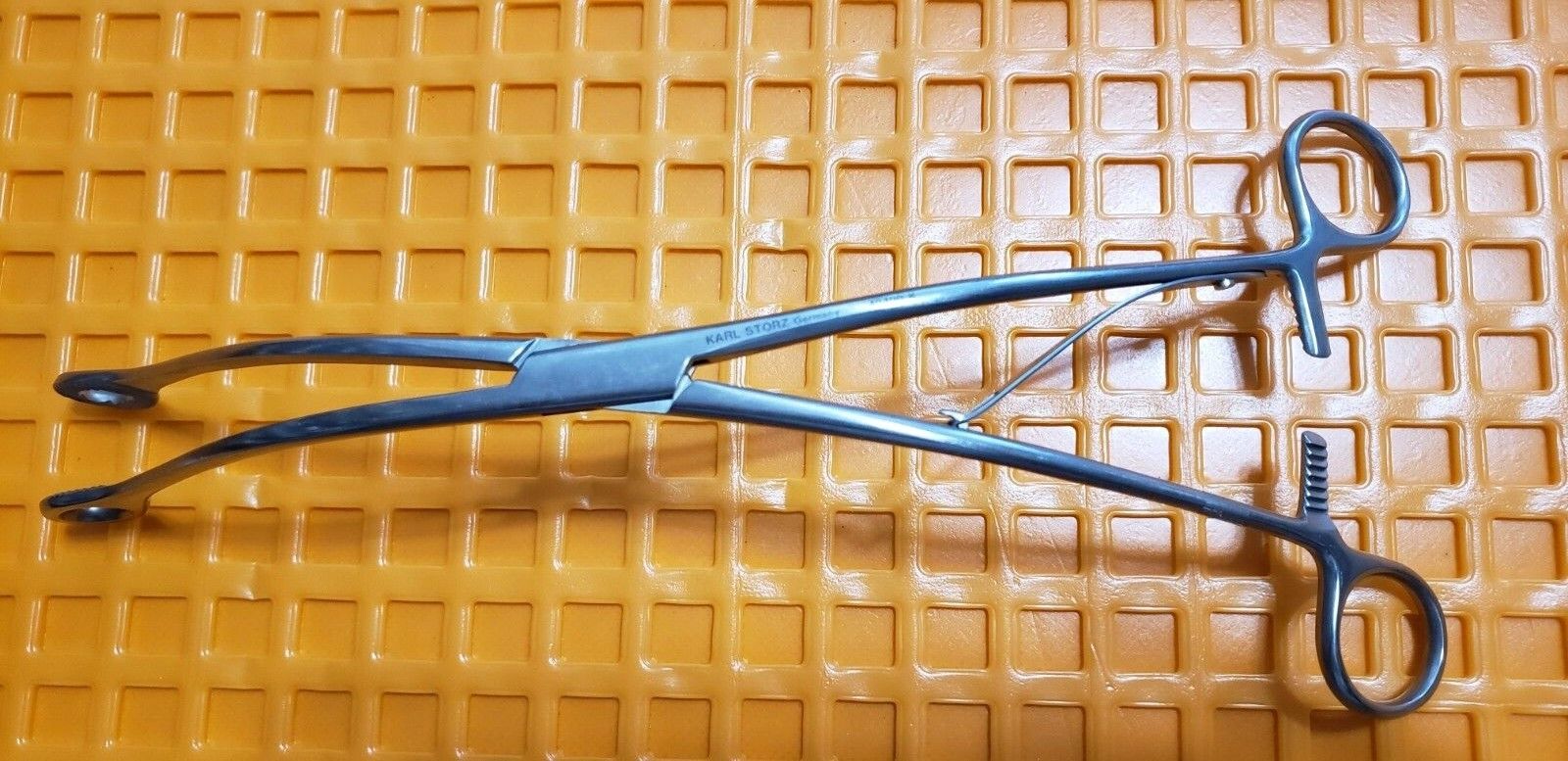 Storz 40400K Surgical Sponge Forceps 10" Curved Jaw & Shanks