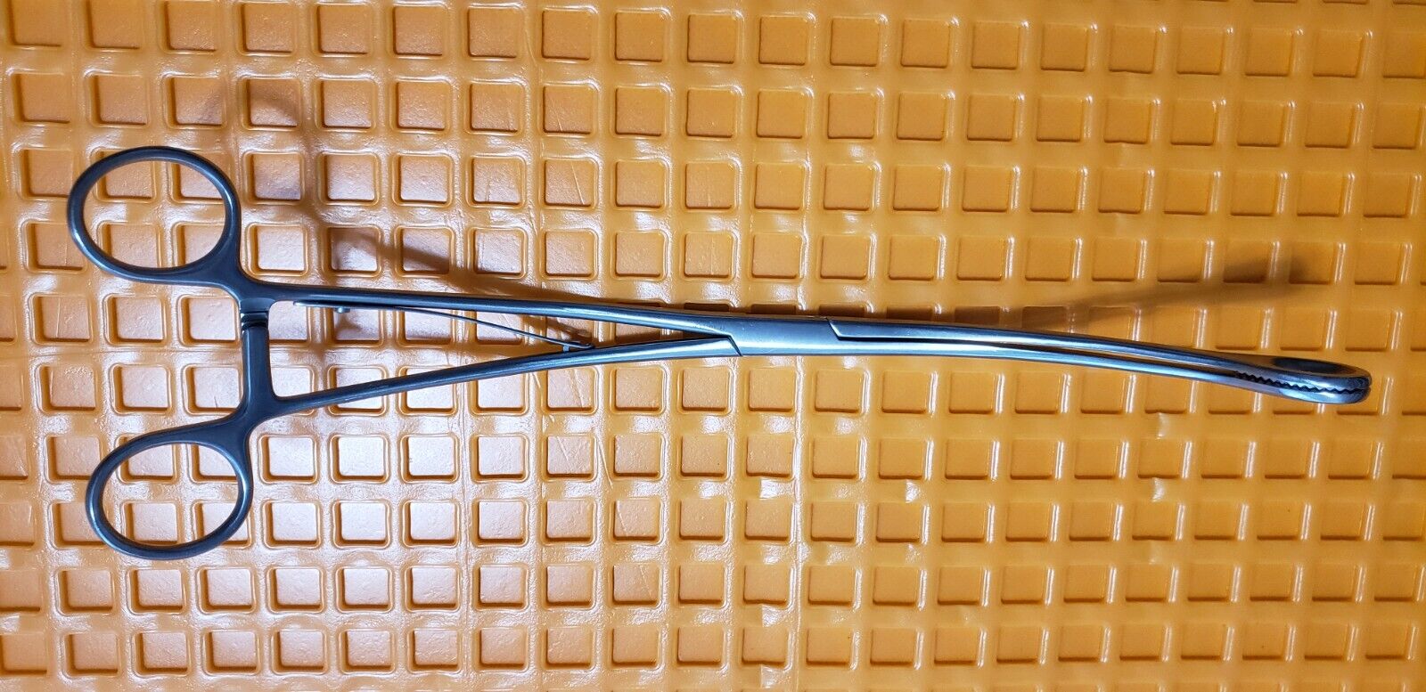 Storz 40400K Surgical Sponge Forceps 10" Curved Jaw & Shanks