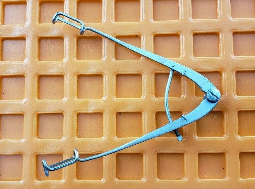 Storz Surgical Ophthalmic Clark Eye Speculum with Adjustable Screw.